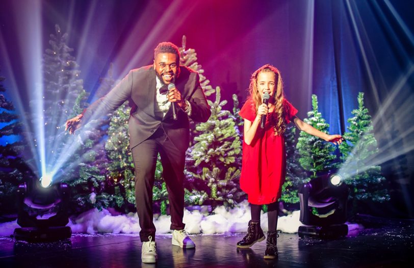 Gerald Biansisa und Kinder-Solistin Vivienne.