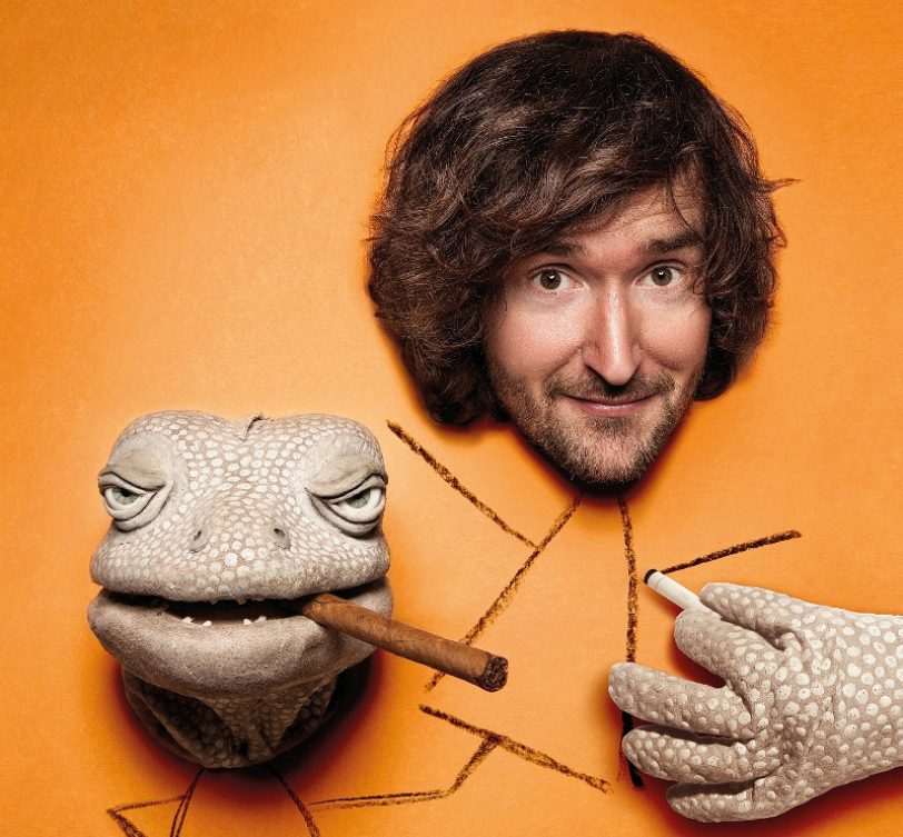 Michael Hatzius und seine Echse.