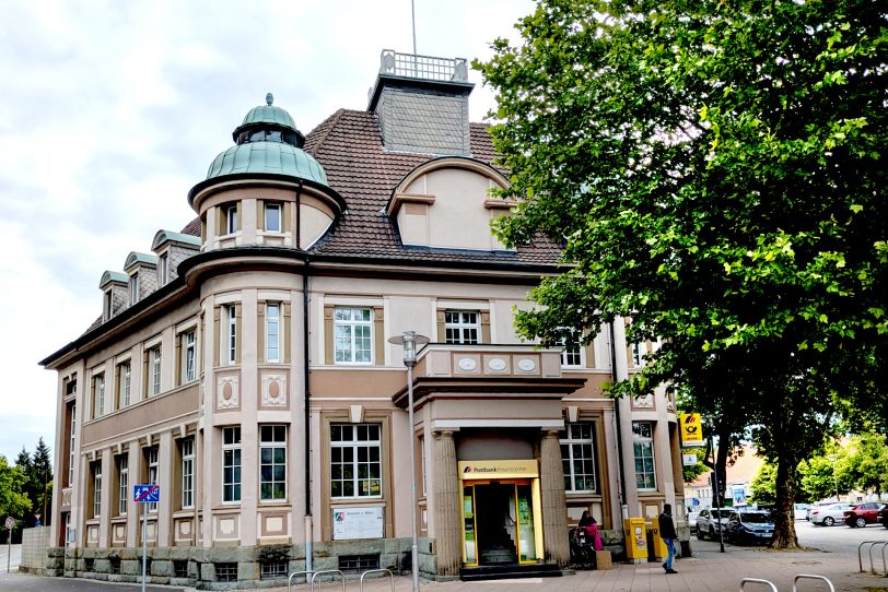 Die Postbank Filiale in Wanne schließt im Juli 2025 ihre Pforten. Die Filiale ist in einem unter Denkmalschutz stehendem Baudenkmal untergebracht, das in den Jahren 1901-1914 errichtet wurde.